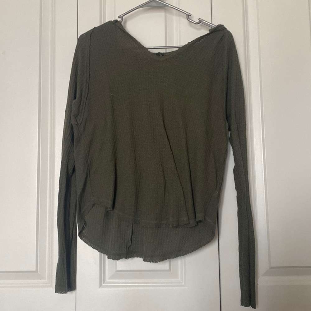 green hooded shirt